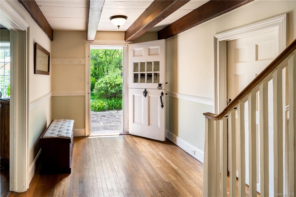 15 Sickletown Road Pearl River, NY 10965 - Photo 7 of 35 a view of a hallway with wooden floor and staircase