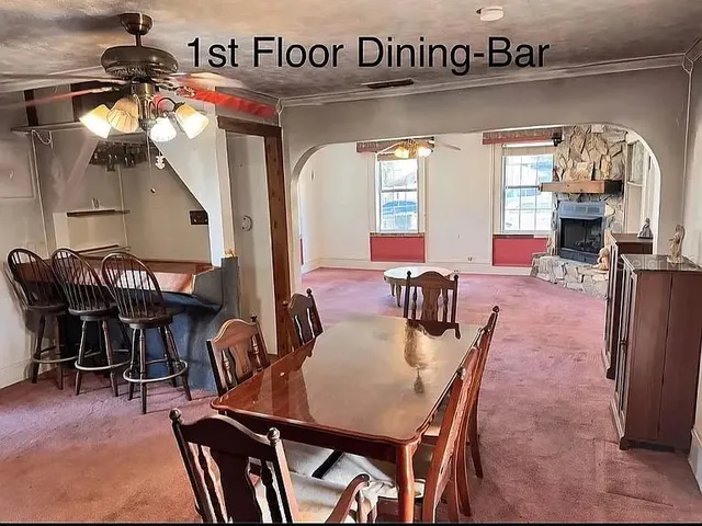 a view of a dining room with furniture