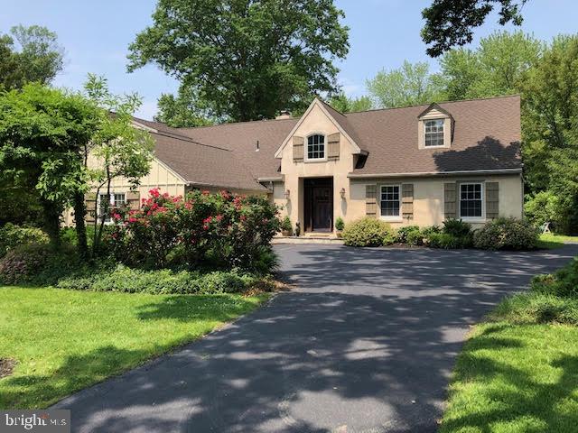 500 North Spring Mill Road Villanova, PA 19085 - Photo 1 of 35 exterior front with lush plantings