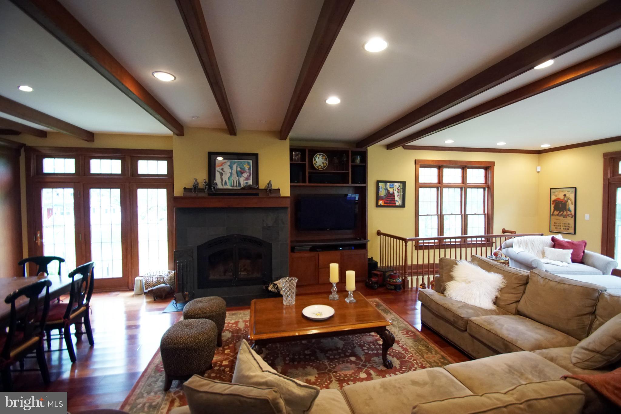 500 North Spring Mill Road Villanova, PA 19085 - Photo 12 of 35 great room /fp/built ins, beamed ceiling