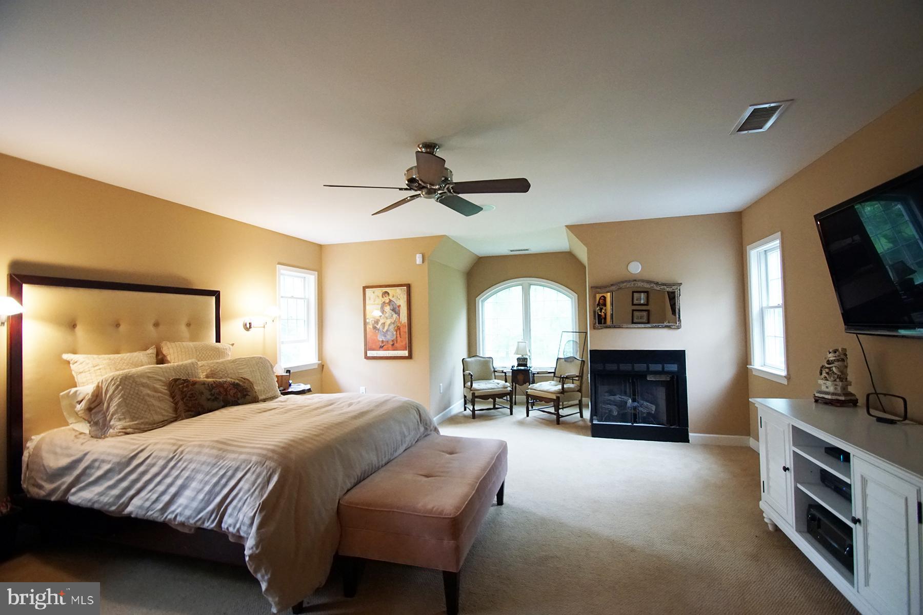 500 North Spring Mill Road Villanova, PA 19085 - Photo 23 of 35 master bedroom suite /fireplace, sitting area