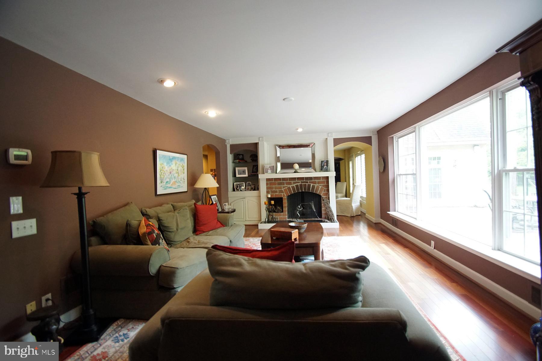 500 North Spring Mill Road Villanova, PA 19085 - Photo 4 of 35 living room with fp, & built ins