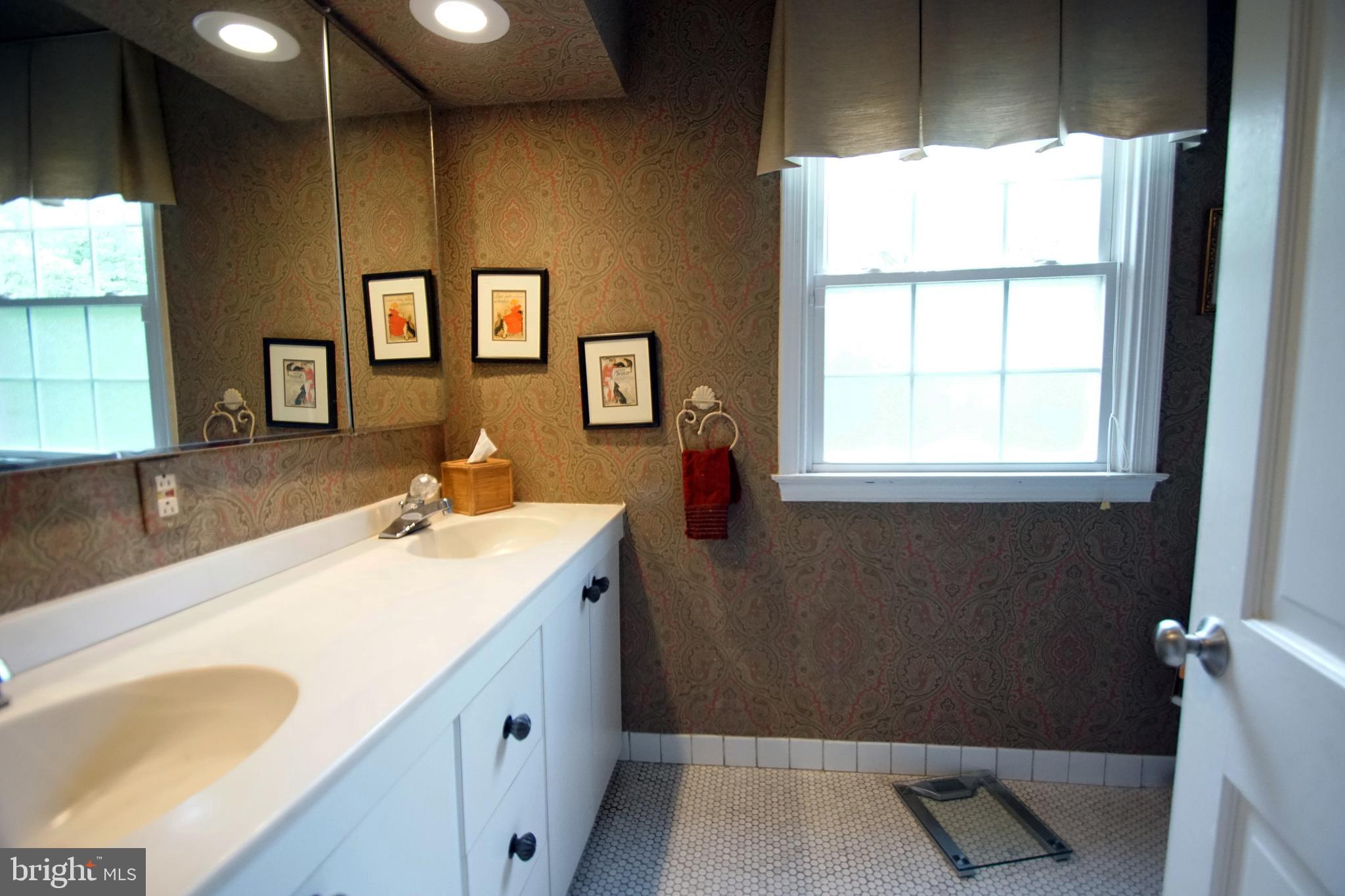 500 North Spring Mill Road Villanova, PA 19085 - Photo 31 of 35 hall bath with double bowl vanity