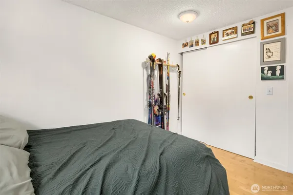 a bed room with a bed and a walk in closet