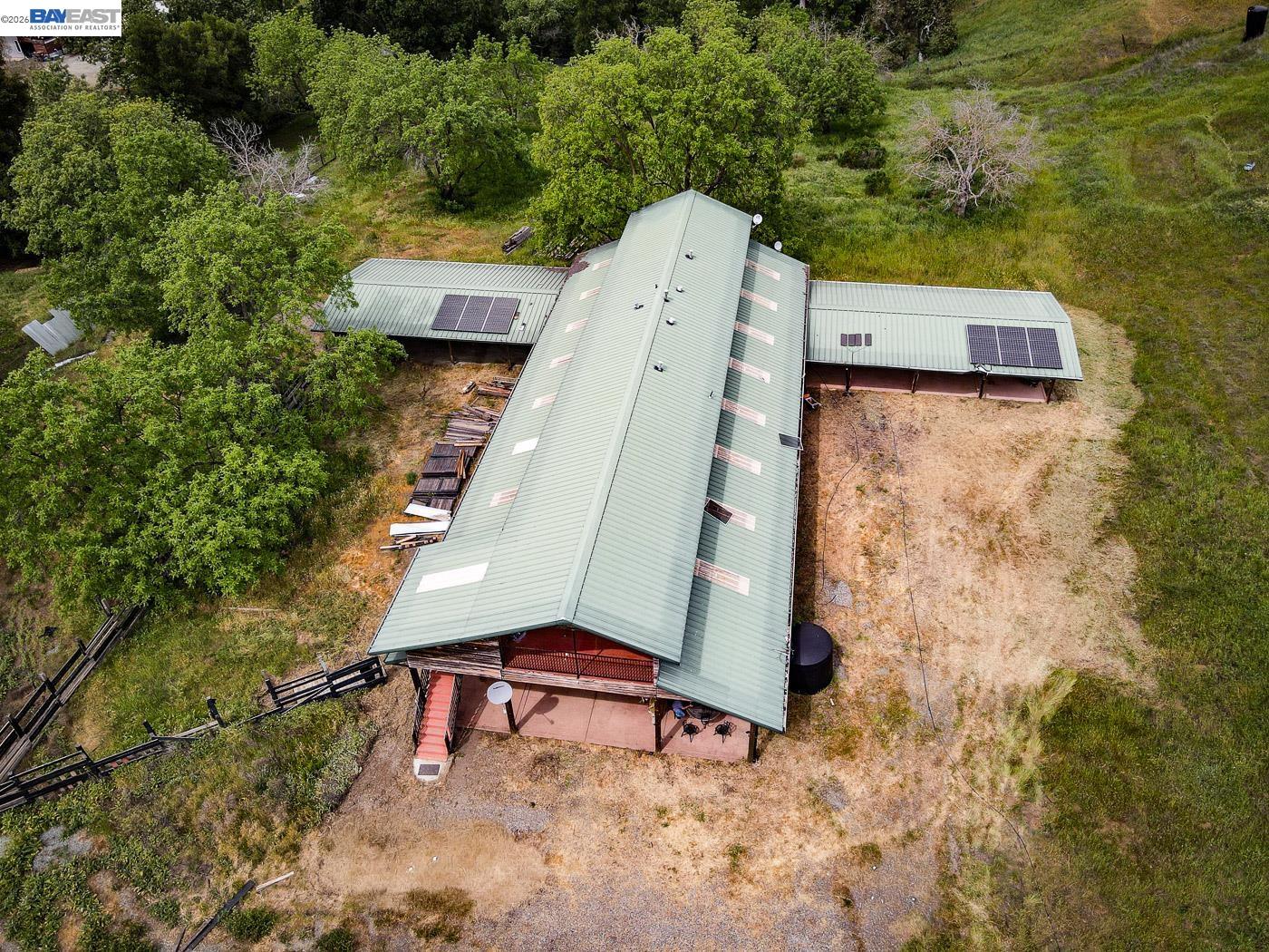 6115 Morgan Territory Road Clayton, CA 94517 - Photo 2 of 60 an aerial view of a house with a yard and trees