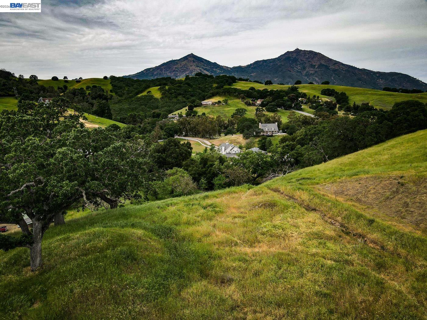 6115 Morgan Territory Road Clayton, CA 94517 - Photo 33 of 60 a view of a lush green hillside and houses