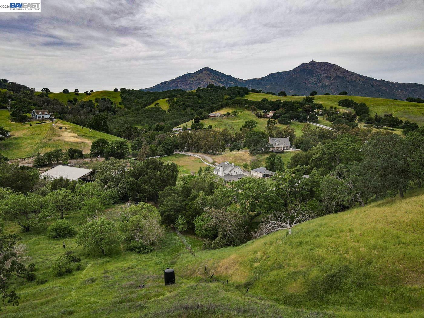6115 Morgan Territory Road Clayton, CA 94517 - Photo 37 of 60 a view of a lush green hillside and houses