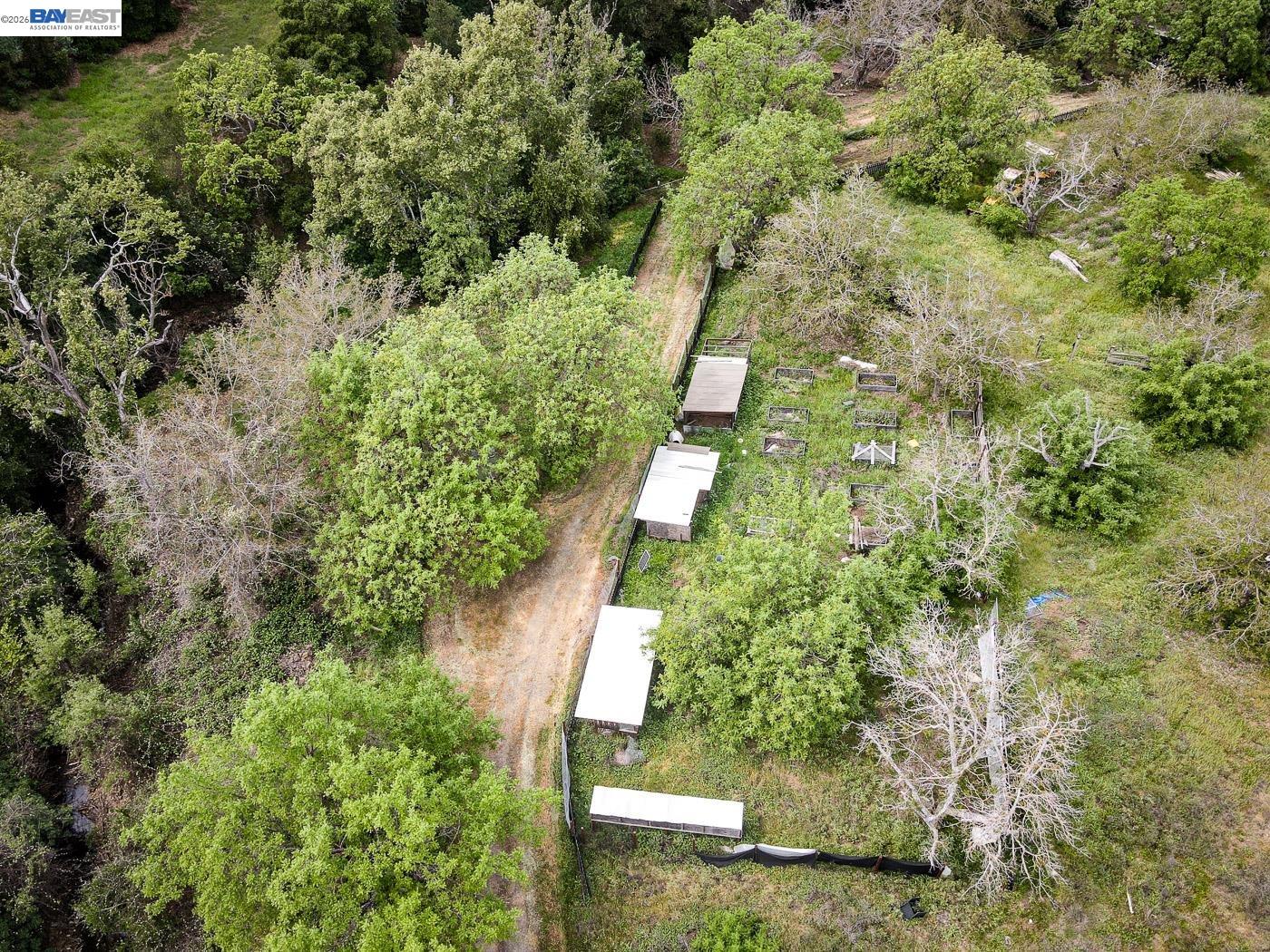 6115 Morgan Territory Road Clayton, CA 94517 - Photo 55 of 60 an aerial view of residential house with outdoor space and trees all around