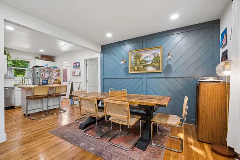 a reading room with furniture and wooden floor