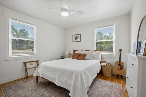 a bedroom with a bed and furniture