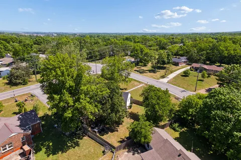 an aerial view of residential house with outdoor space