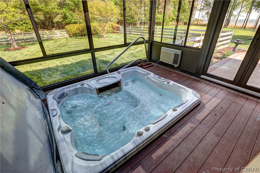 3678 Windmill Point Road White Stone, VA 22578 - Photo 32 of 50 Glassed in spa room with heating and air conditioning with river views.