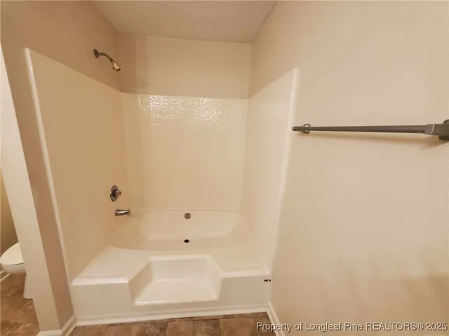 a view of a livingroom from a hallway