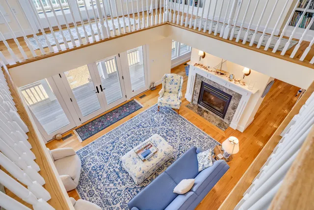 a view of an entryway with wooden floor