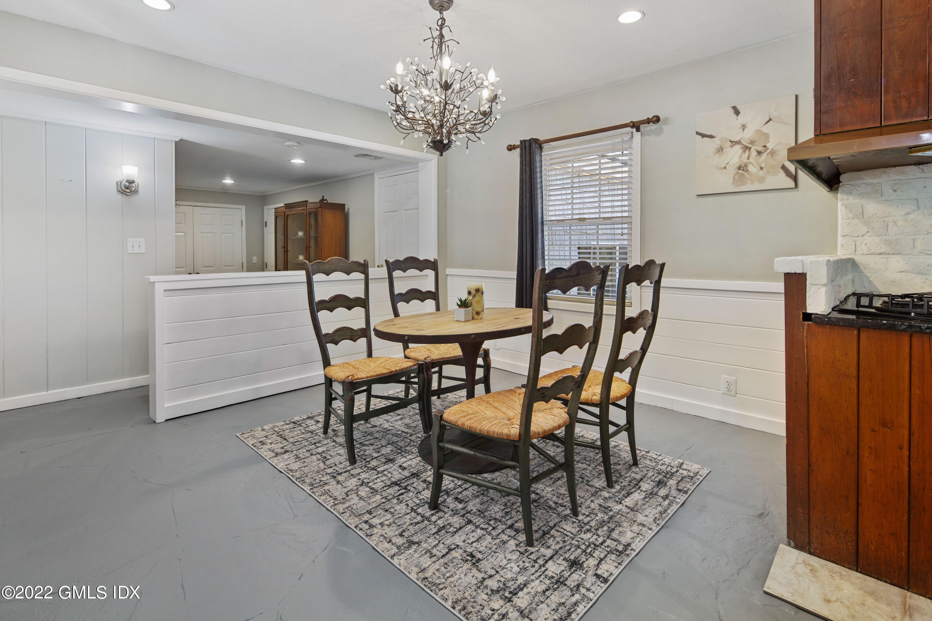 66 Simsbury Road Stamford, CT 06905 - Photo 15 of 40 a dining room with furniture and window