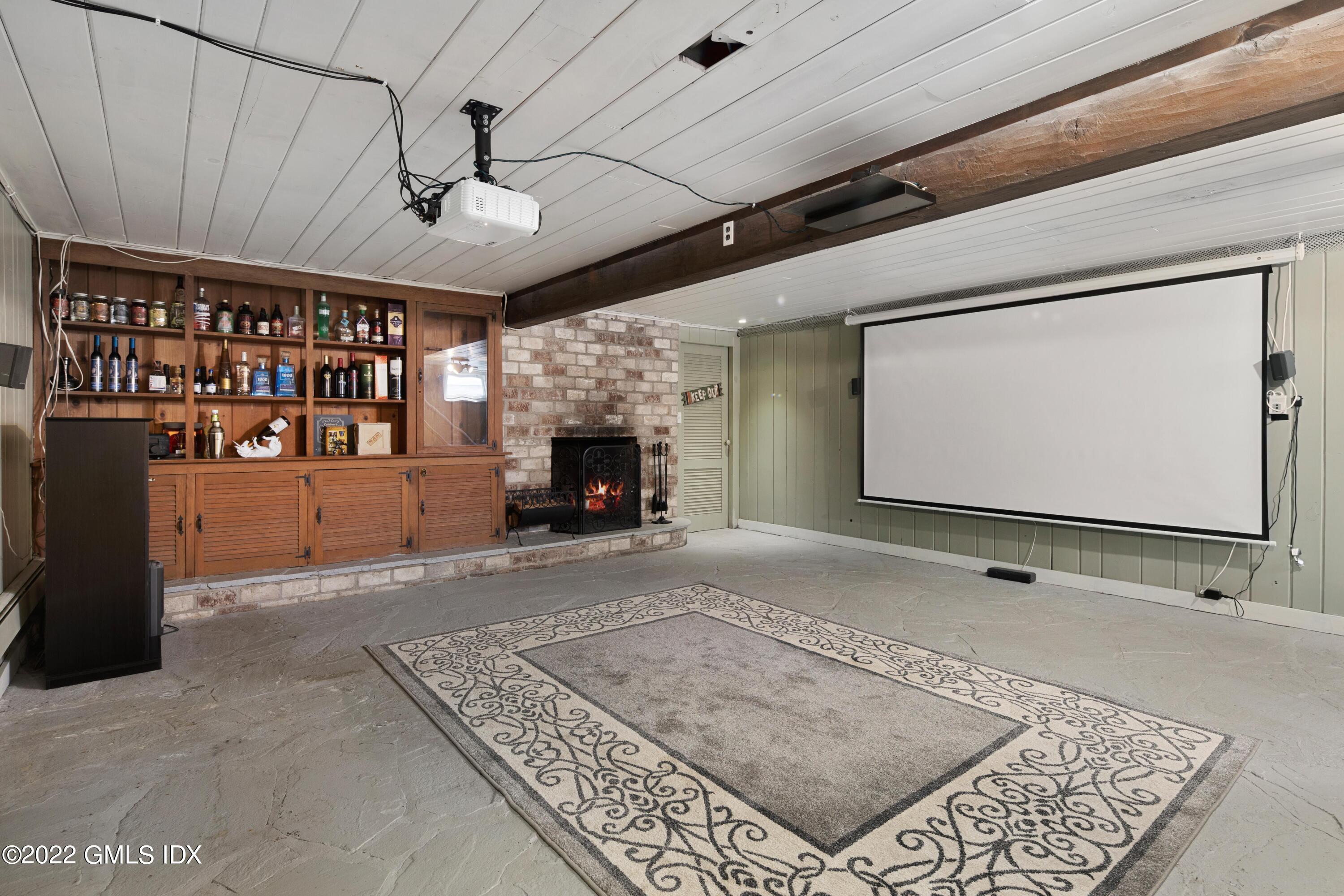 66 Simsbury Road Stamford, CT 06905 - Photo 29 of 40 a view of an empty room with window and fireplace