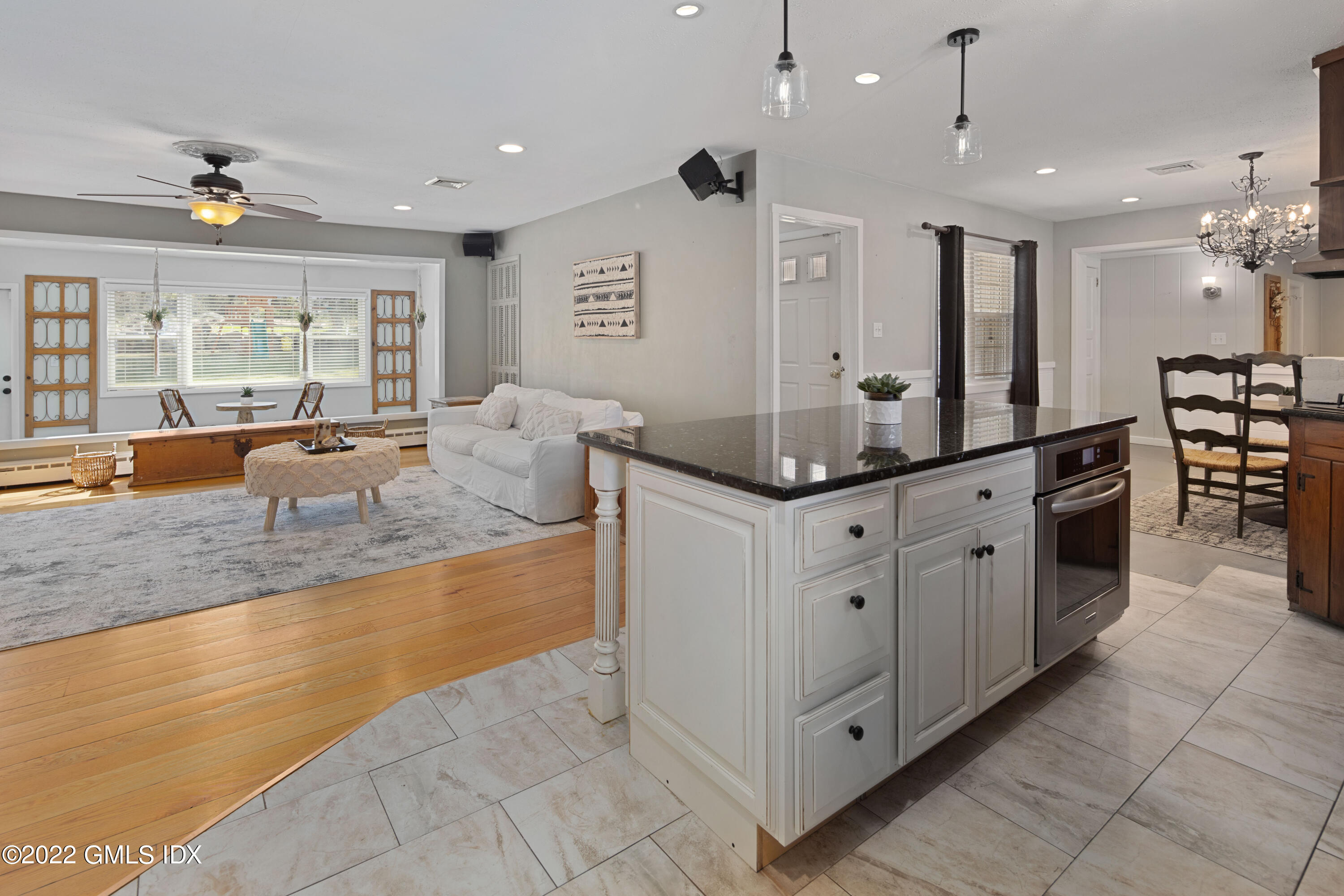 66 Simsbury Road Stamford, CT 06905 - Photo 3 of 40 a large kitchen with kitchen island granite countertop a large counter top and sink
