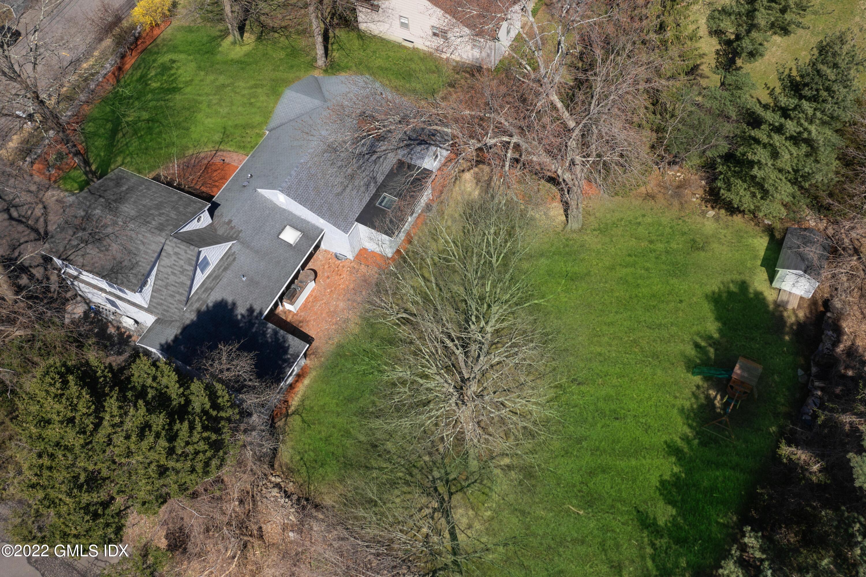 66 Simsbury Road Stamford, CT 06905 - Photo 34 of 40 an aerial view of a house with a yard