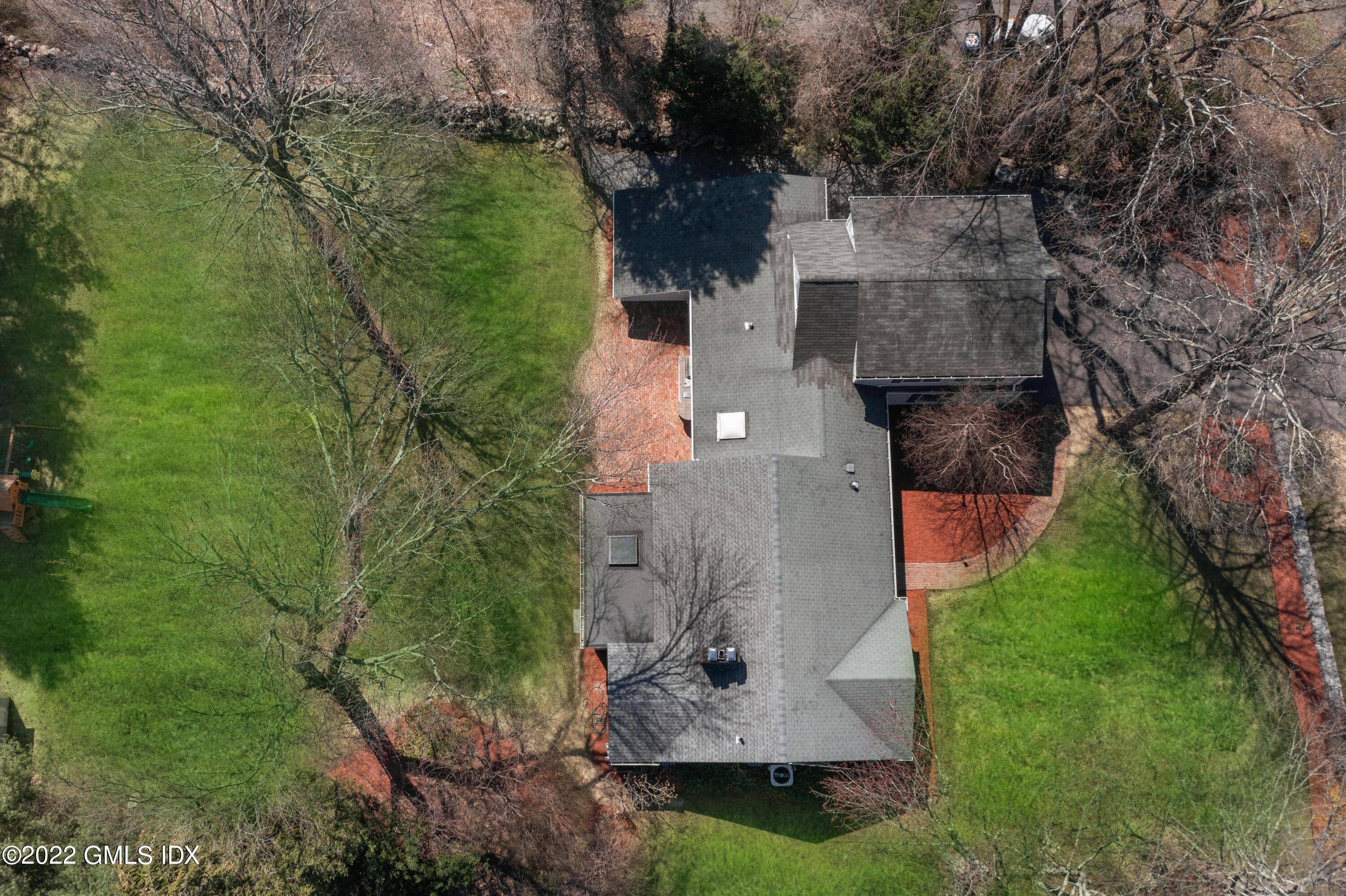 66 Simsbury Road Stamford, CT 06905 - Photo 35 of 40 an aerial view of a house with a yard