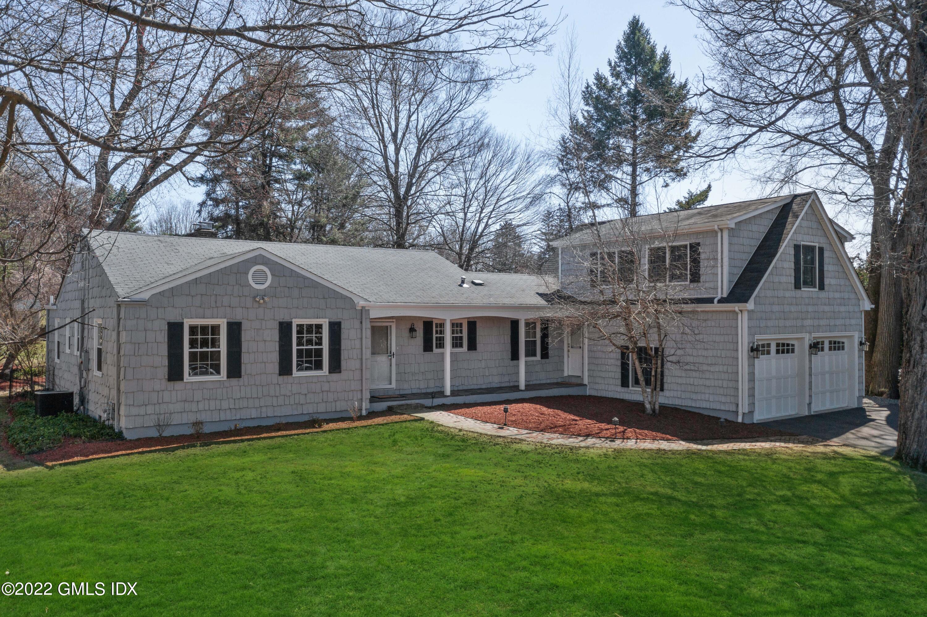 66 Simsbury Road Stamford, CT 06905 - Photo 37 of 40 a front view of a house with a yard
