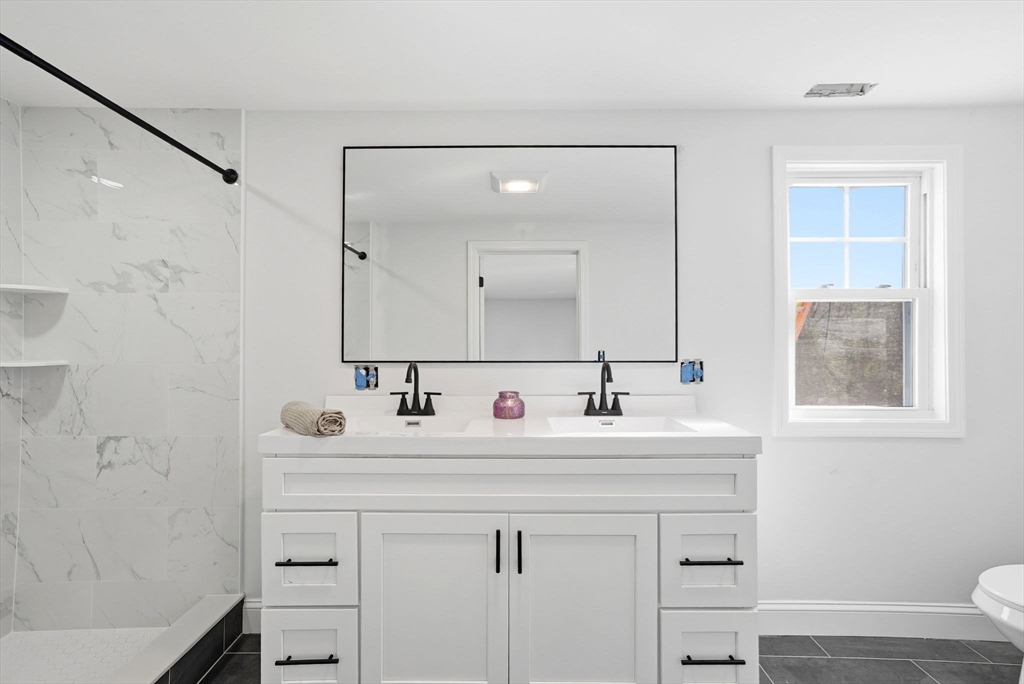 357 Wareham Street Middleboro, MA 02346 - Photo 22 of 42 a bathroom with a double vanity sink mirror and double