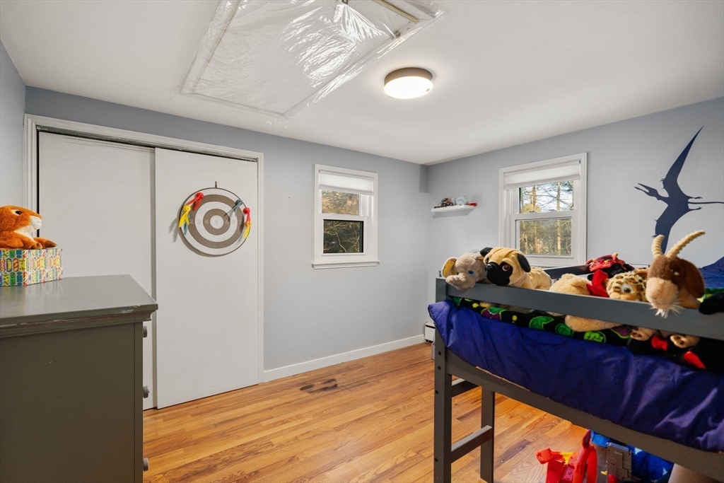 70 Bardin Street Hanover, MA 02339 - Photo 18 of 29 a room with furniture and wooden floor