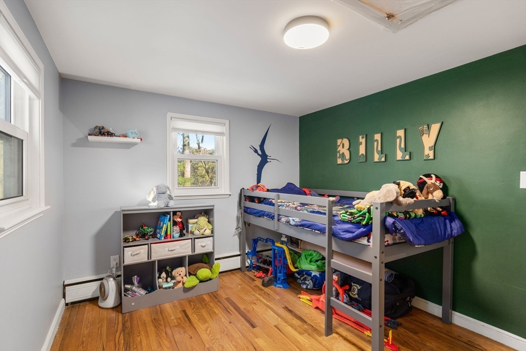 70 Bardin Street Hanover, MA 02339 - Photo 19 of 29 a bedroom with a bed and a bookshelf