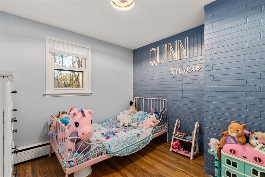 70 Bardin Street Hanover, MA 02339 - Photo 20 of 29 a bedroom with a bed and wooden floor