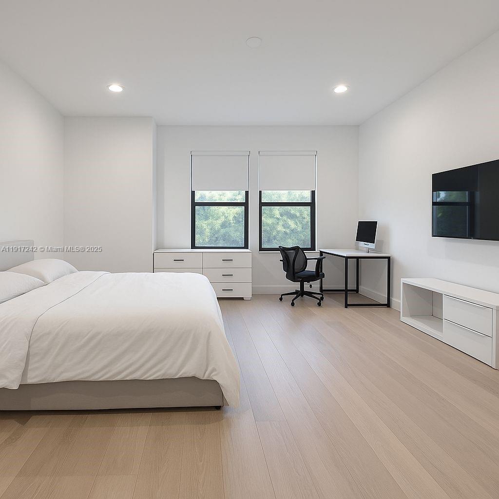 8185 Crystal Downs Avenue Boca Raton, FL 33434 - Photo 12 of 27 a spacious bedroom with a bed and large windows