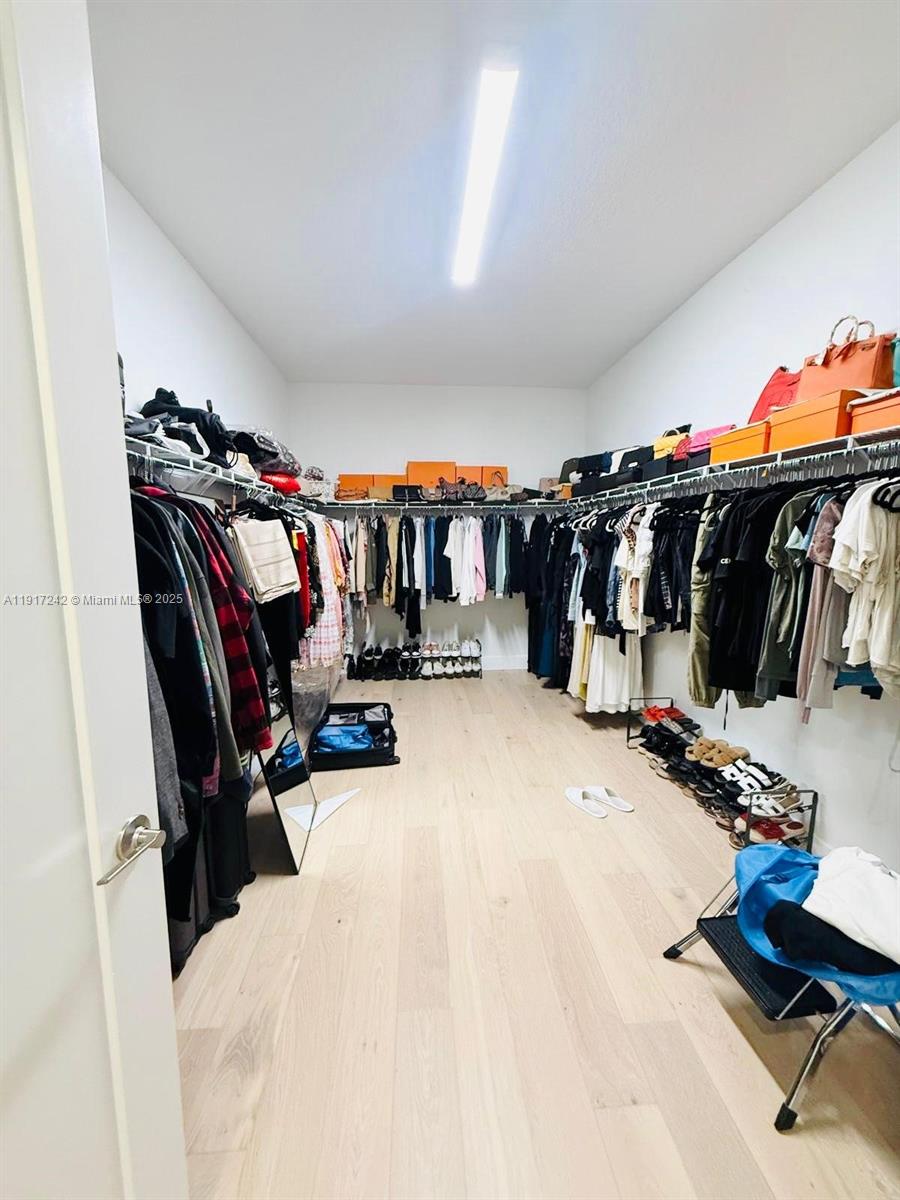 8185 Crystal Downs Avenue Boca Raton, FL 33434 - Photo 14 of 27 a view of a room with gym equipment