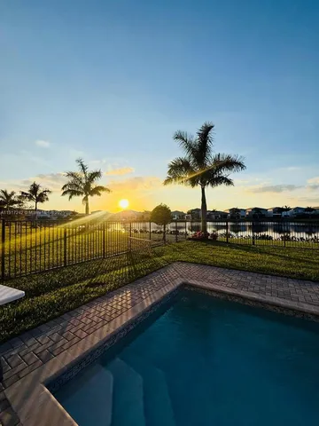 a view of a swimming pool and a terrace