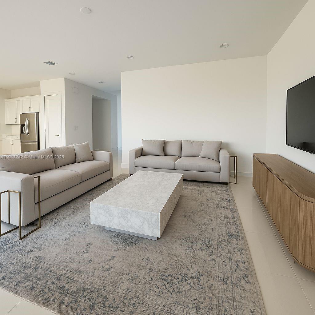 8185 Crystal Downs Avenue Boca Raton, FL 33434 - Photo 4 of 27 a living room with furniture and a couch