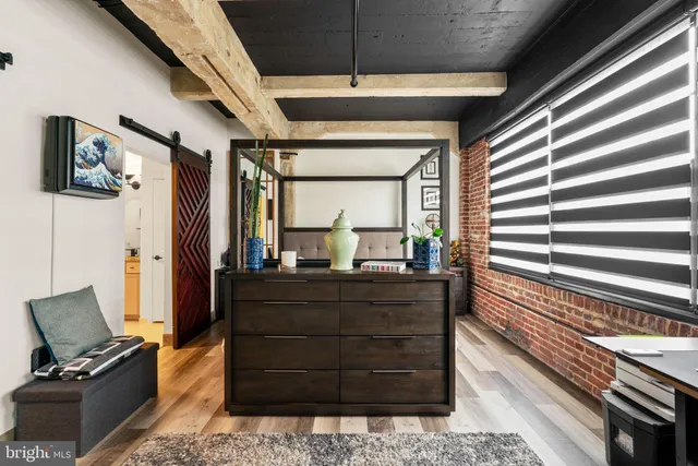 a room with furniture and wooden floor