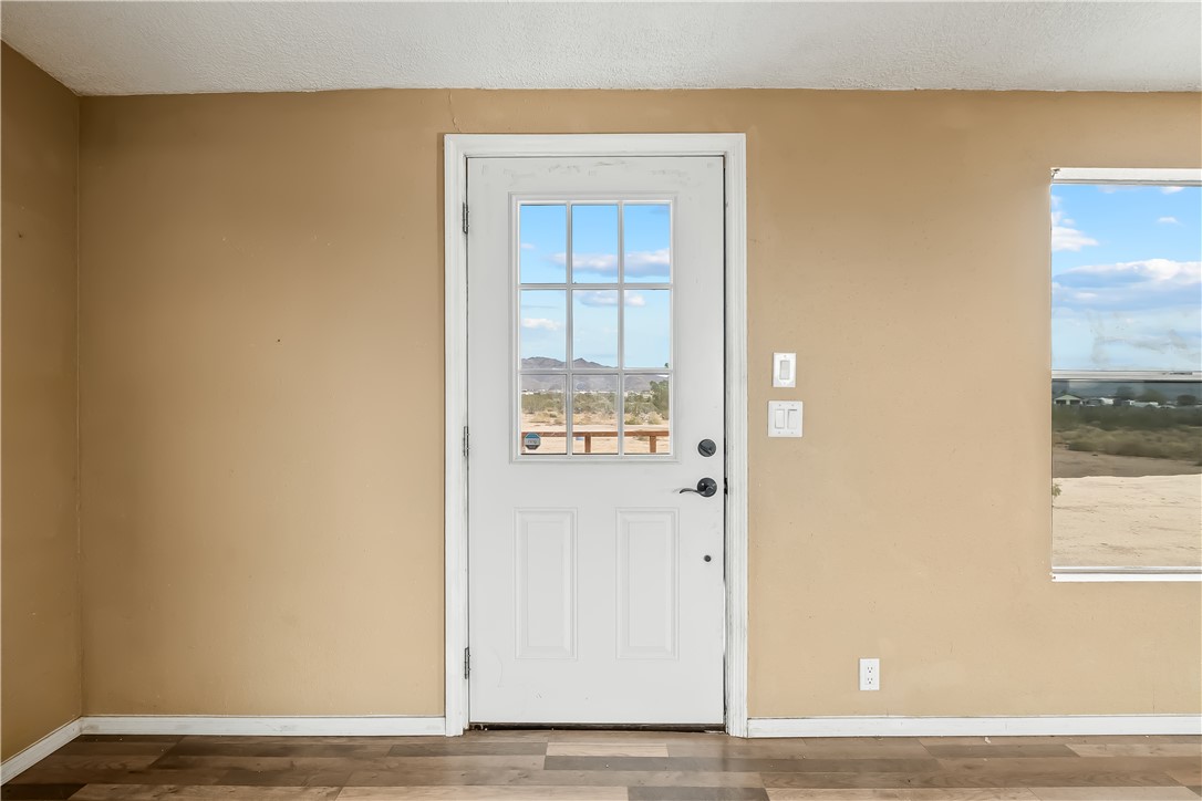 3649 Araby Road Golden Valley, AZ 86413 - Photo 4 of 29 Wood-finish flooring throughout