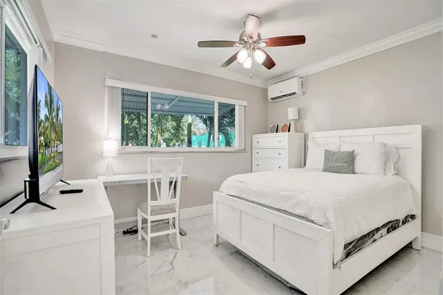 a bedroom with a bed and a table