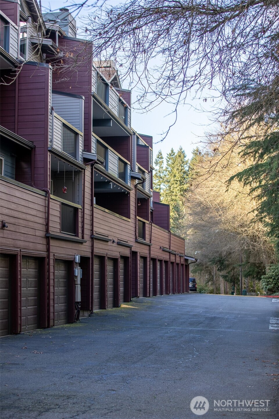 15917 Waynita Way Northeast, Unit E206 Bothell, WA 98011 - Photo 20 of 22 a view of a building with a street