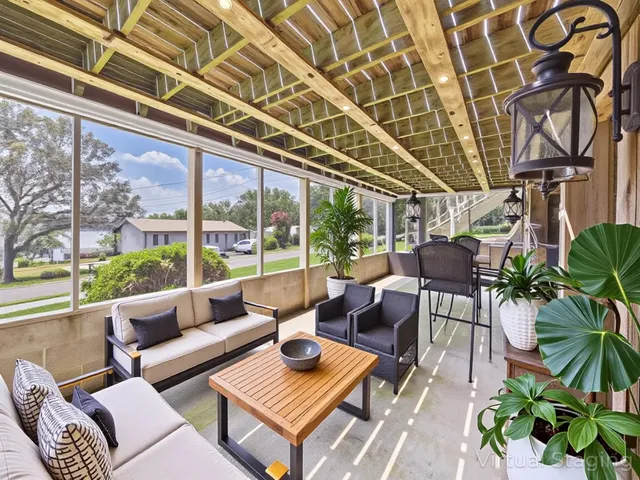 an aerial view of a house with outdoor space pool seating area and yard