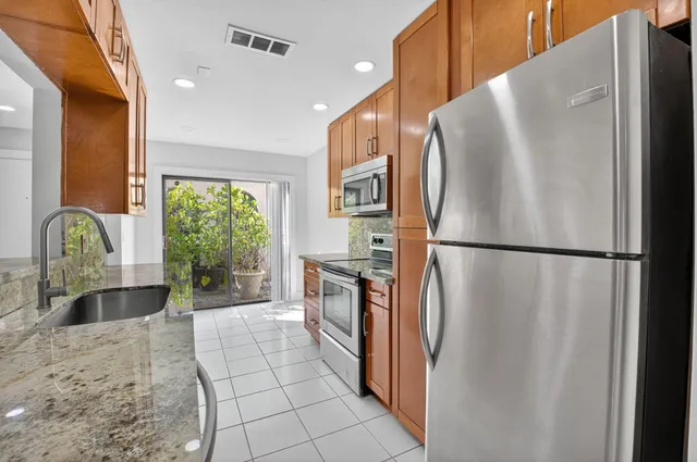 a view of a lake with a yard