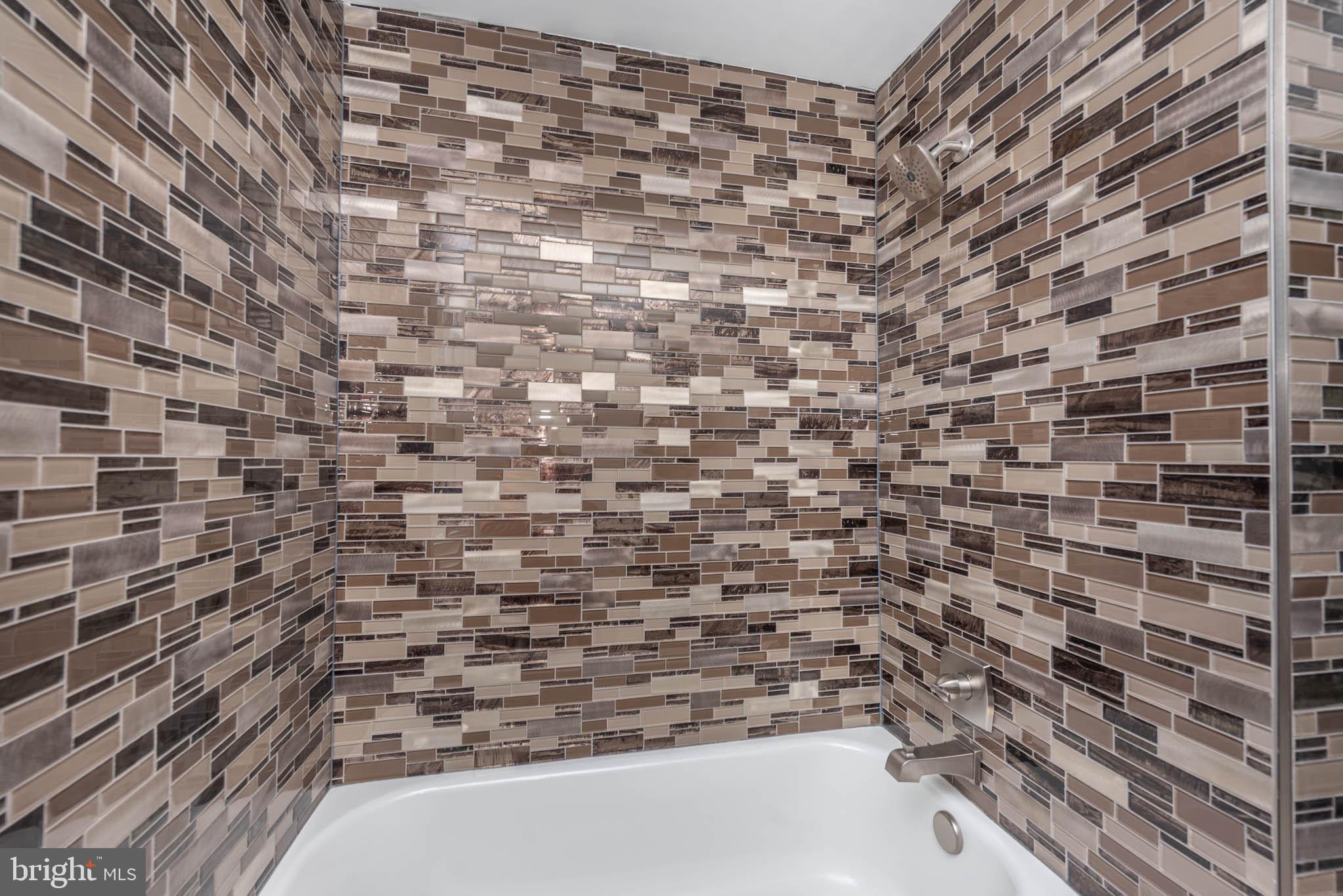 1510 Northbourne Road Baltimore, MD 21239 - Photo 21 of 32 a bathroom with a shower