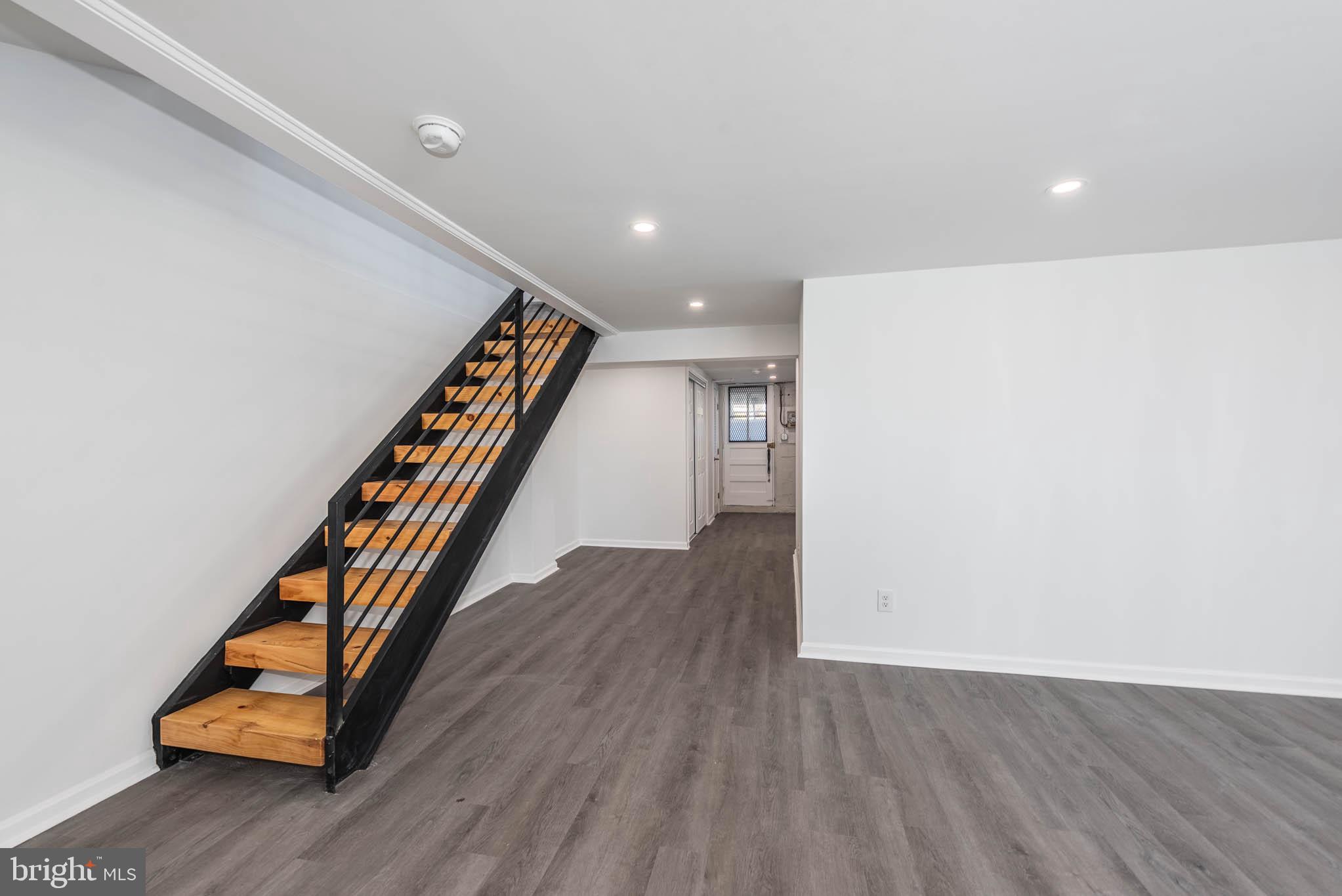 1510 Northbourne Road Baltimore, MD 21239 - Photo 22 of 32 a very nice looking room with wooden floor