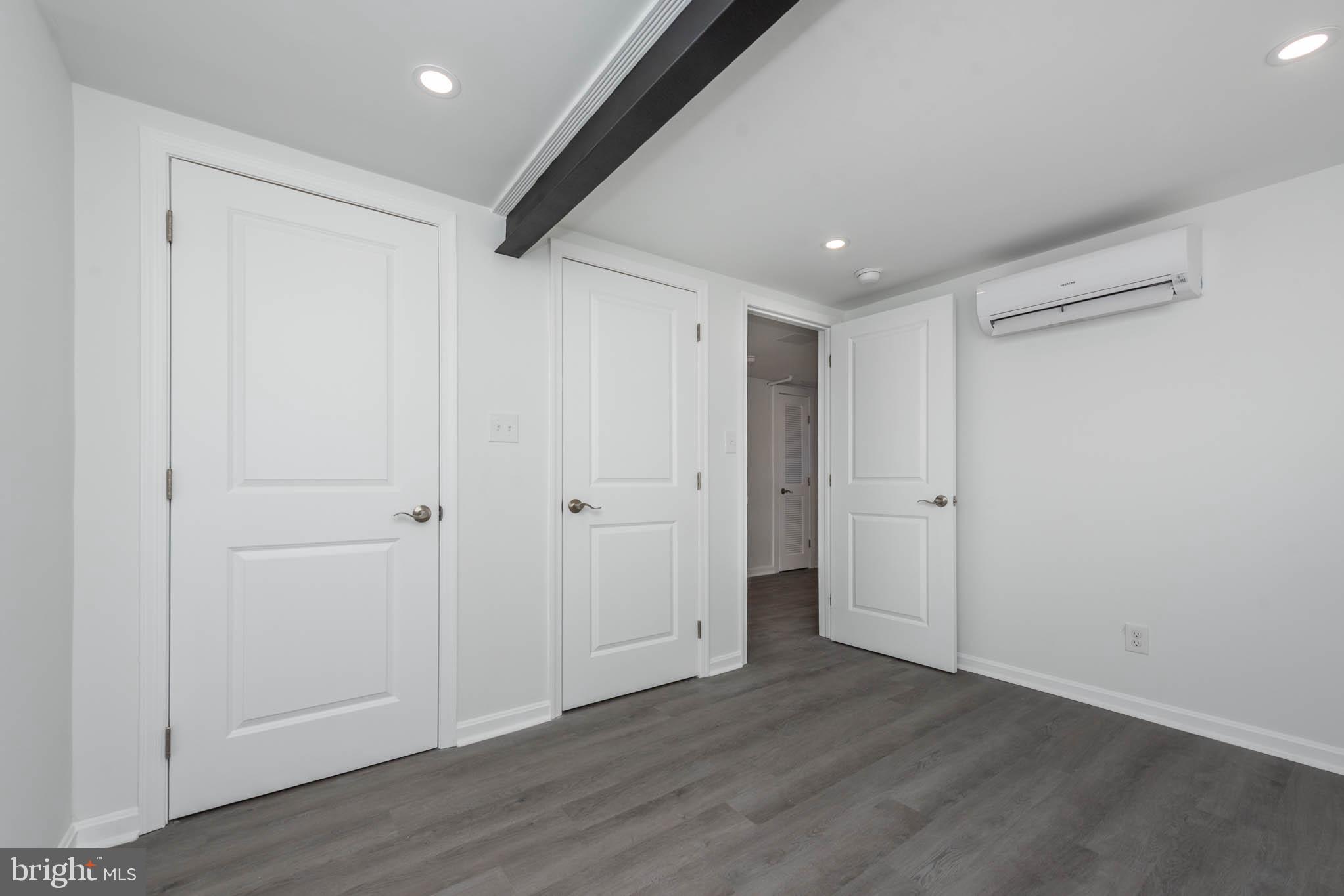 1510 Northbourne Road Baltimore, MD 21239 - Photo 25 of 32 a view of hallway with wooden floor