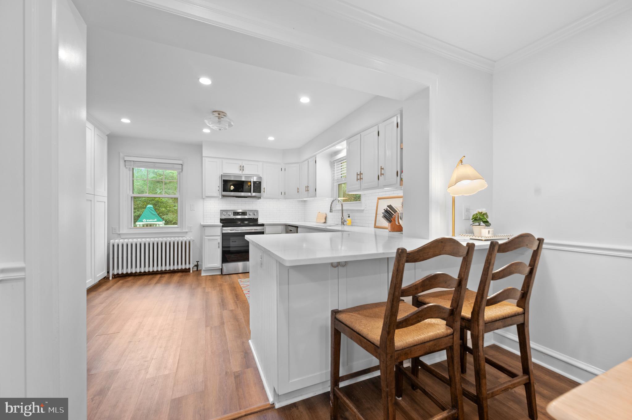 1242 Old Lancaster Road Berwyn, PA 19312 - Photo 11 of 42 a living room with furniture and a wooden floor