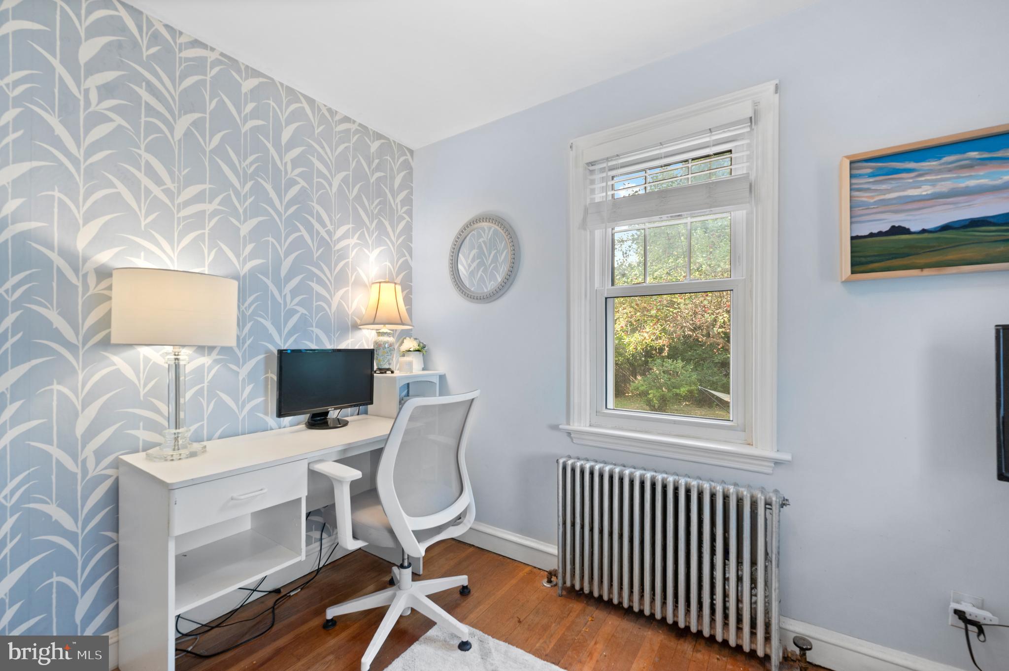 1242 Old Lancaster Road Berwyn, PA 19312 - Photo 20 of 42 a view of a workspace with furniture and a window