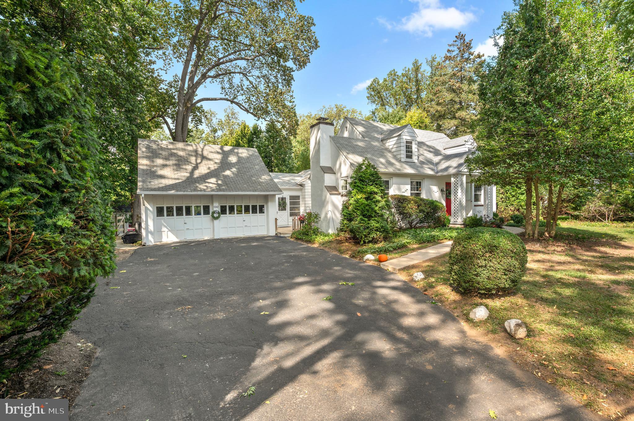 1242 Old Lancaster Road Berwyn, PA 19312 - Photo 2 of 42 a view of a building with trees all around