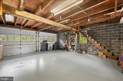 a view of empty room with wooden ceiling