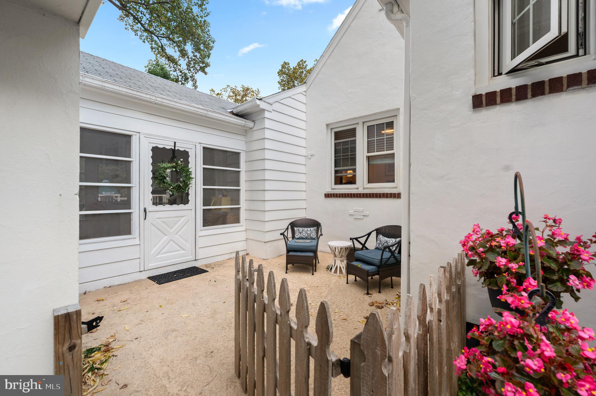 1242 Old Lancaster Road Berwyn, PA 19312 - Photo 37 of 42 a view of a house with a yard and sitting space