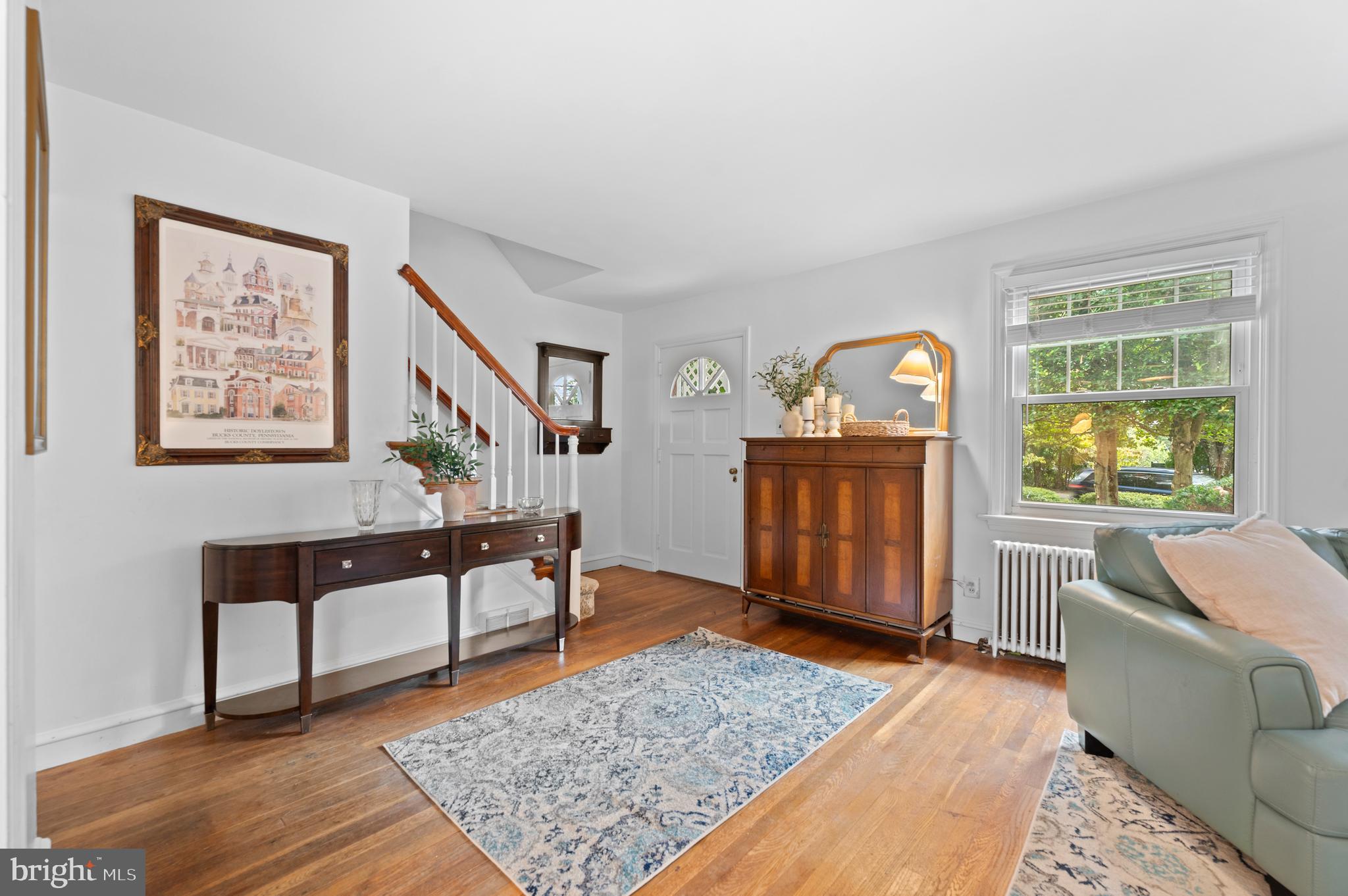 1242 Old Lancaster Road Berwyn, PA 19312 - Photo 5 of 42 a living room with furniture and a rug