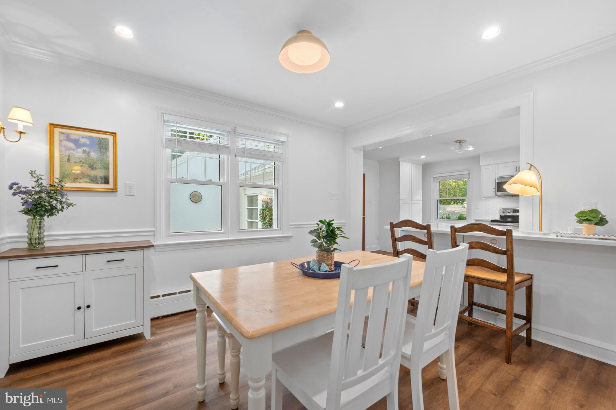 1242 Old Lancaster Road Berwyn, PA 19312 - Photo 10 of 42 a view of a dining room with furniture and wooden floor