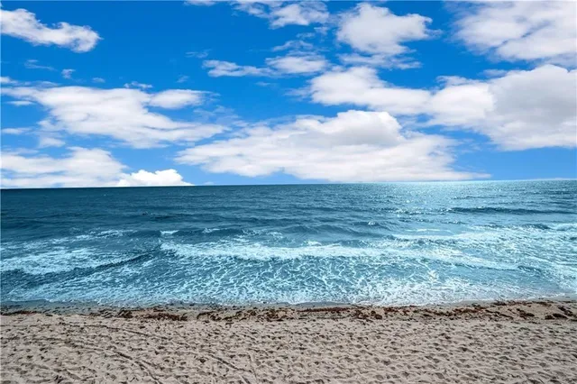 a view of balcony with ocean view