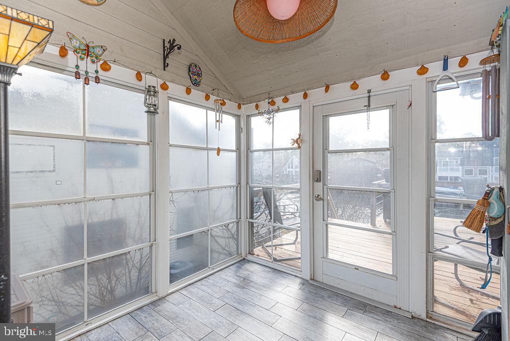11 Clipper Court Ocean Pines, MD 21811 - Photo 34 of 109 Sun room leading from kitchen to wrap around deck